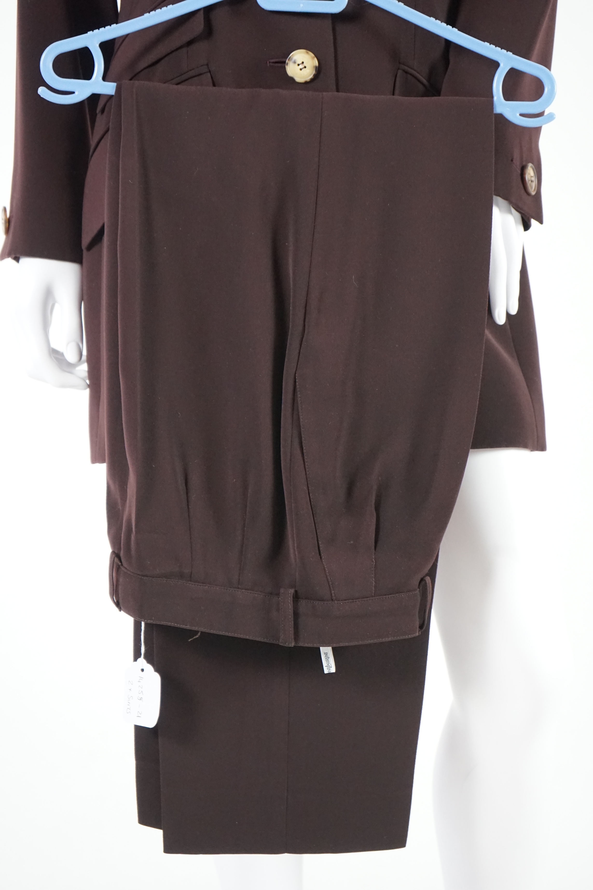 Two vintage Yves Saint Laurent variation lady's trouser suits, F 42 (UK 14). Please note alterations to make the waist smaller may have been carried out on some of the skirts. Proceeds to Happy Paws Puppy Rescue.